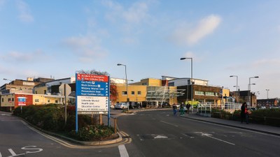 Main building of West Middlesex University Hospital on a sunny day